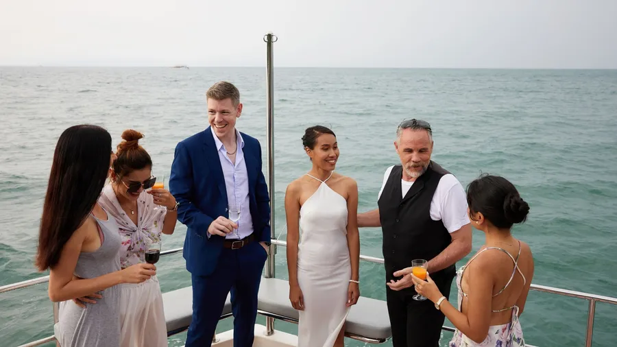 group of friends having fun and party celebrating on luxury yacht