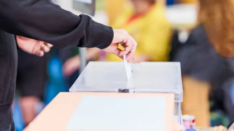 Voting candidate campaign in democracy ballot box