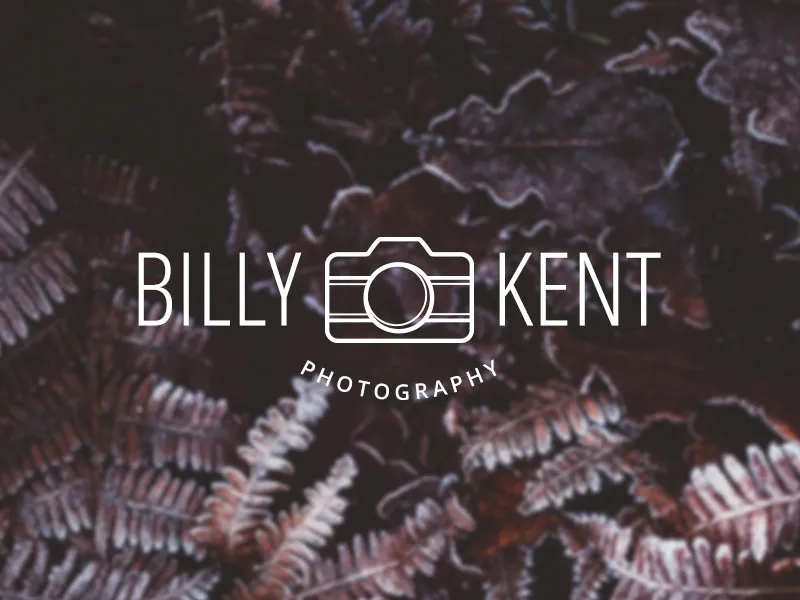 Logo with a camera in the middle