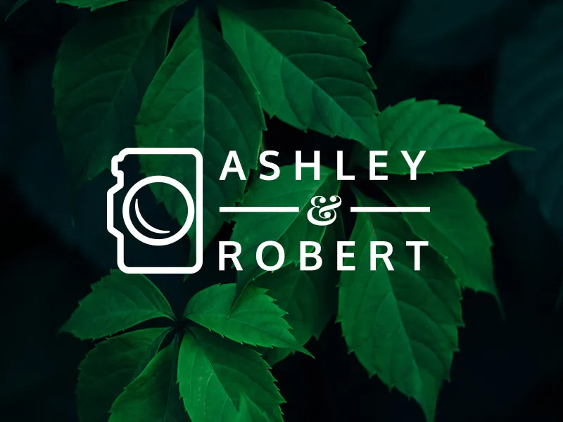 Logo with a camera on its side